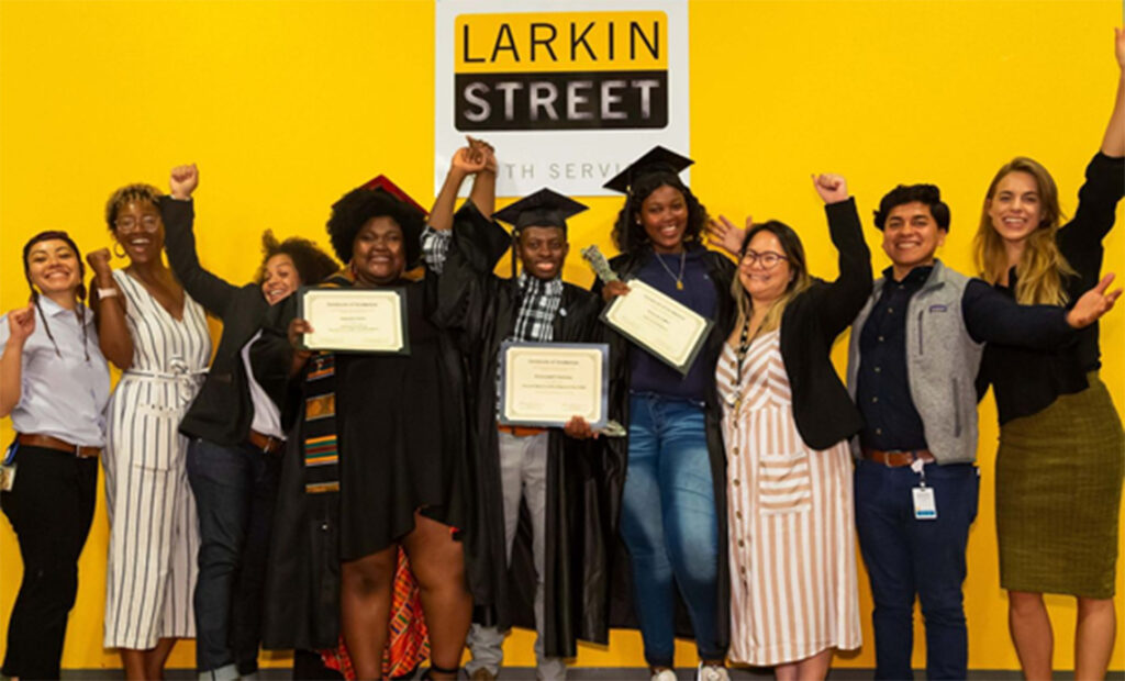 A photo of happy graduates at Larkin Street
